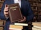 Jurist holds PROBATE LAW book. Probate lawÂ refers to the process that manages any assets and debts left behind by a deceased